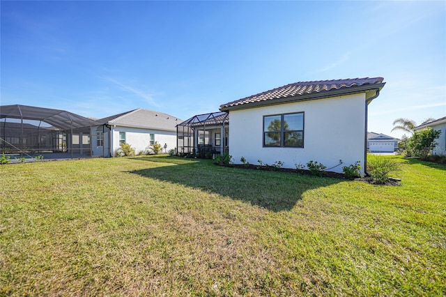 view of yard featuring a lanai