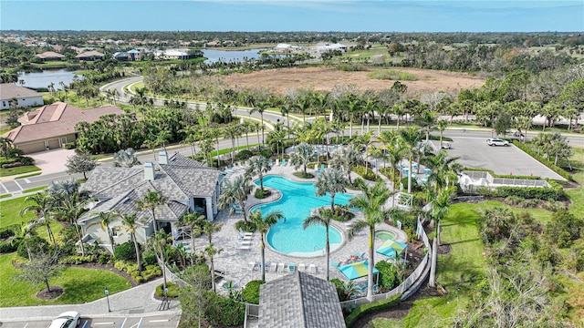 birds eye view of property featuring a water view