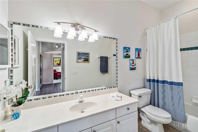 full bathroom featuring vanity, shower / tub combo, and toilet