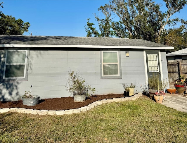 2191 Park Rd, Venice, FL 34293 - view of front of property featuring fence and a front lawn