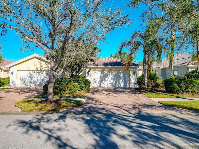 view of front of property featuring a garage