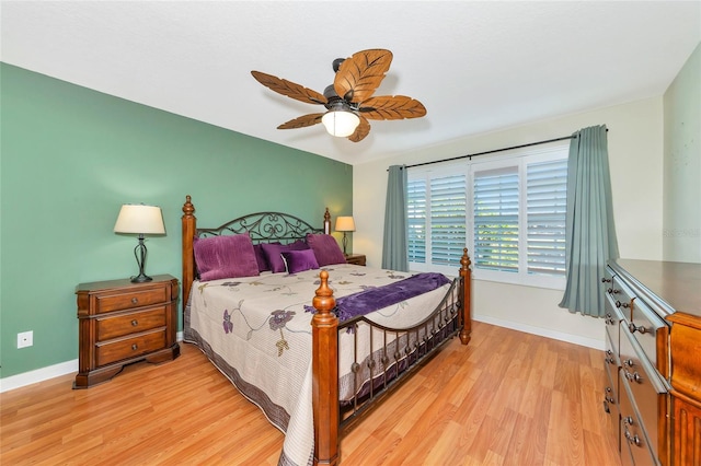 bedroom featuring light hardwood / wood-style flooring and ceiling fan