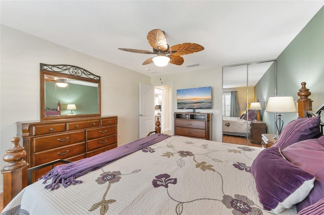 bedroom with ceiling fan and hardwood / wood-style floors