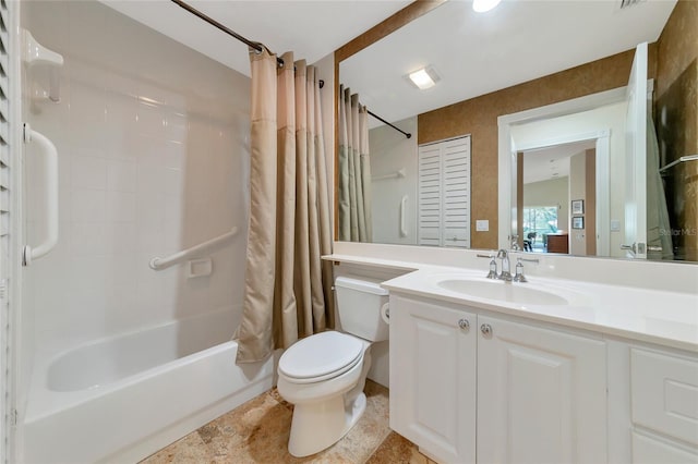 full bathroom featuring vanity, shower / tub combo, and toilet