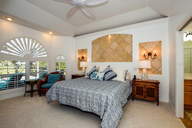 carpeted bedroom with lofted ceiling and ceiling fan