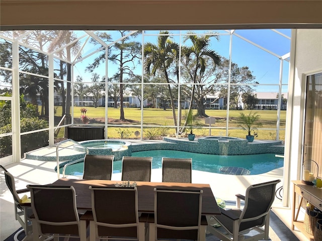 view of swimming pool with a lanai, a lawn, a patio, and an in ground hot tub