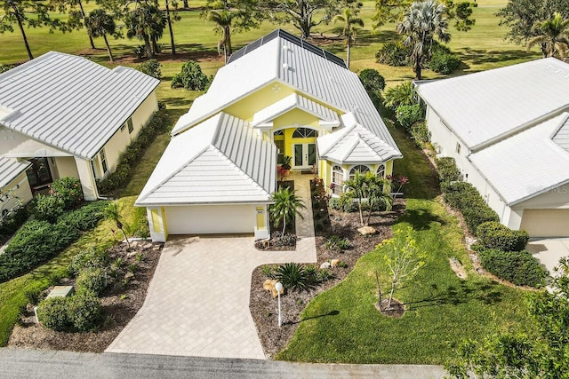 view of front of home featuring french doors and a garage