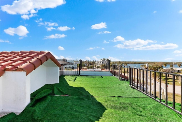 view of yard with a water view