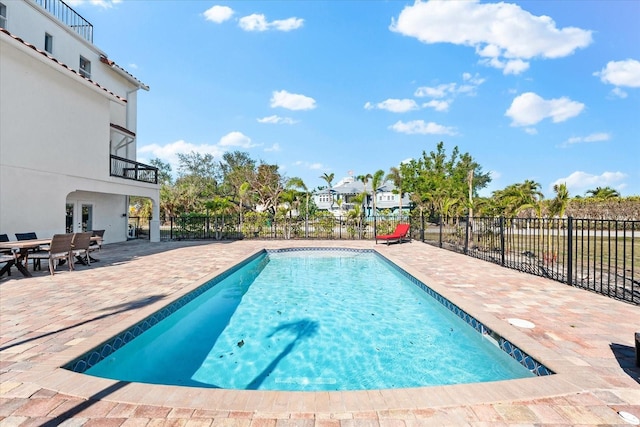 view of pool with a patio area