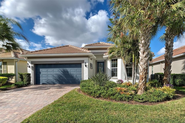 mediterranean / spanish-style house featuring a garage