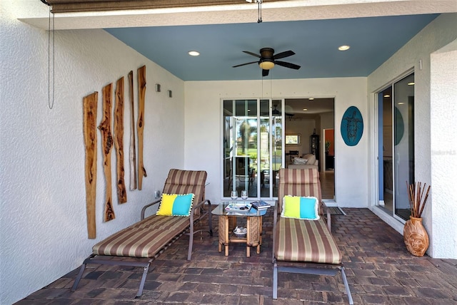 view of patio with ceiling fan