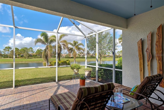 sunroom with a water view