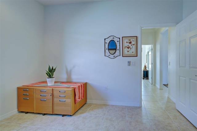 interior space with light tile patterned floors