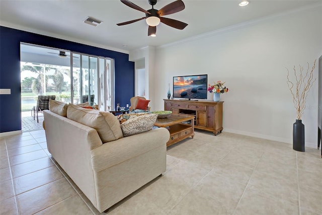 tiled living room with ceiling fan and ornamental molding