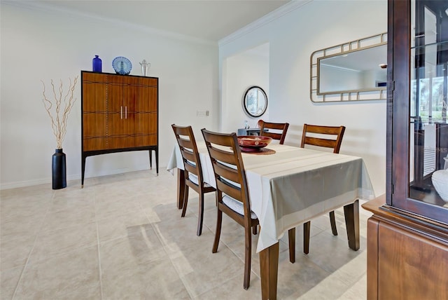 tiled dining space with ornamental molding