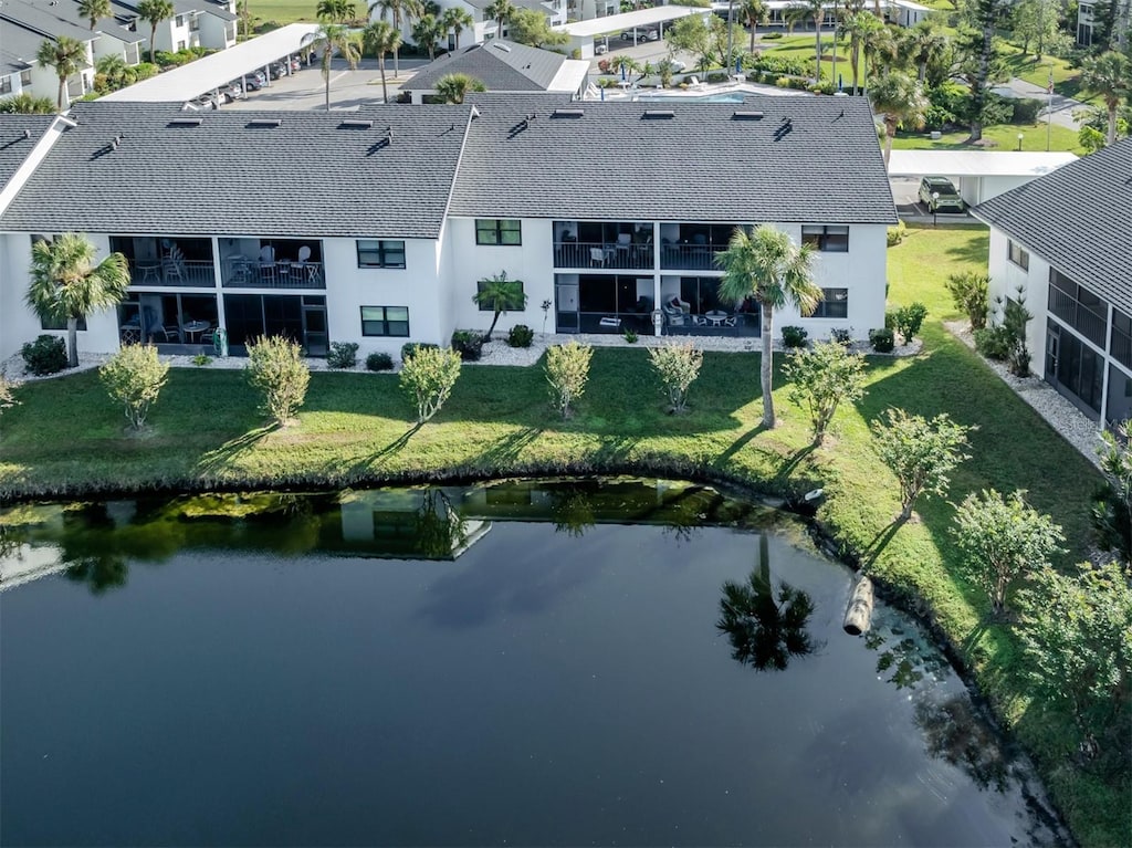 bird's eye view with a water view