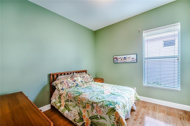 bedroom featuring hardwood / wood-style flooring