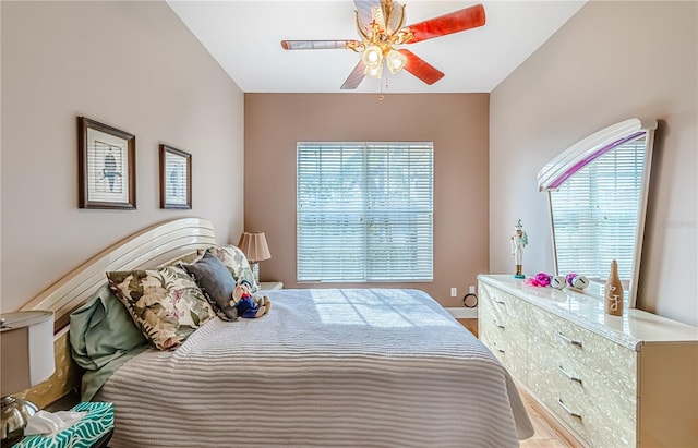 bedroom featuring ceiling fan and light hardwood / wood-style floors