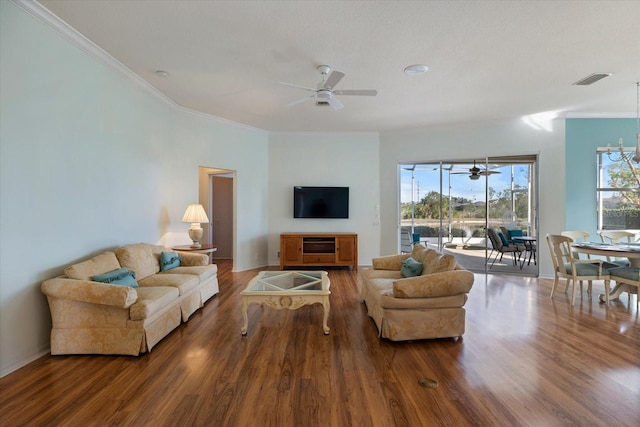 living room featuring ornamental molding and hardwood / wood-style flooring