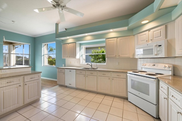 kitchen with white appliances, tasteful backsplash, ceiling fan, ornamental molding, and sink