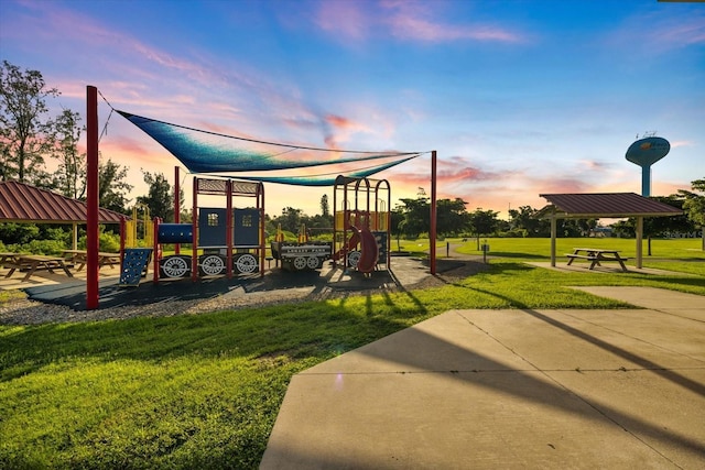 playground at dusk with a gazebo and a yard