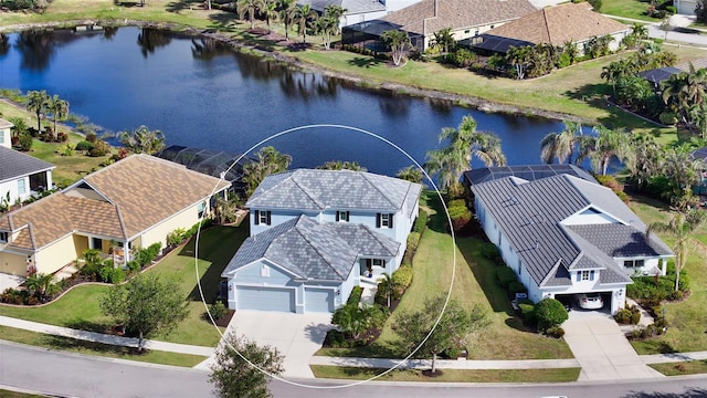 aerial view featuring a water view