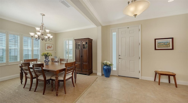 tiled dining room featuring crown molding and a notable chandelier