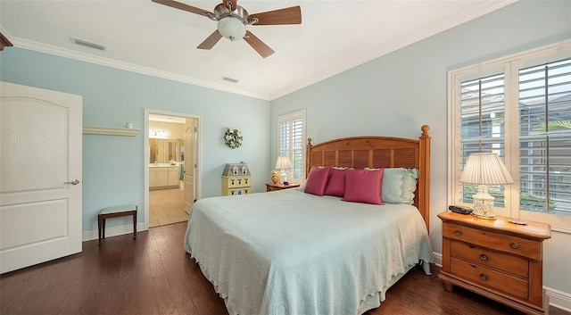 bedroom with ensuite bath, ceiling fan, dark hardwood / wood-style floors, and ornamental molding