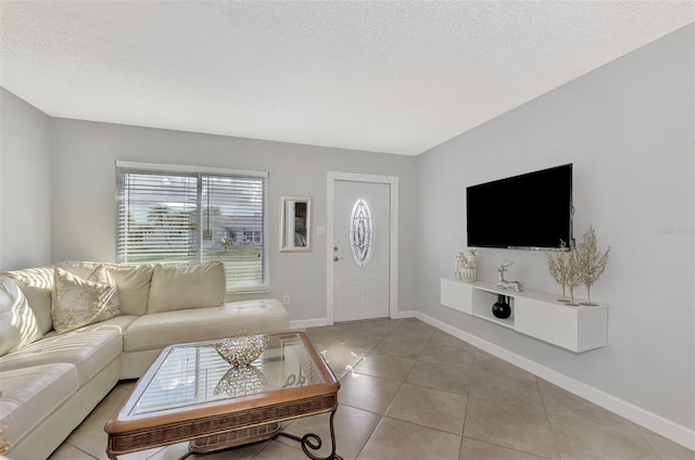 tiled living room with a textured ceiling