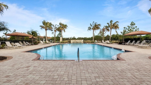 view of pool featuring a gazebo and a patio