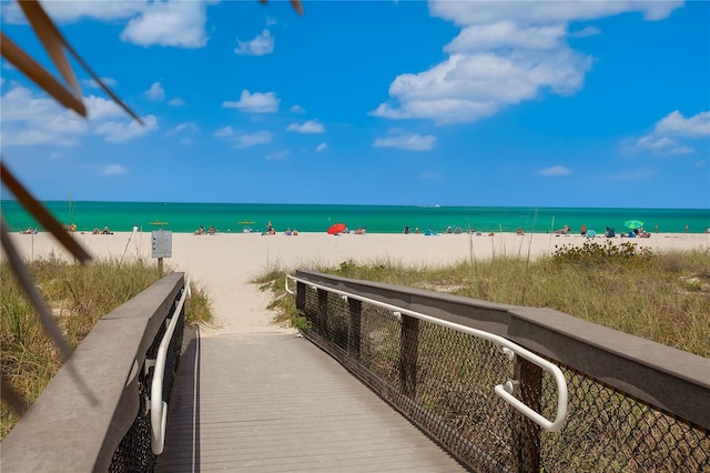 property view of water featuring a beach view