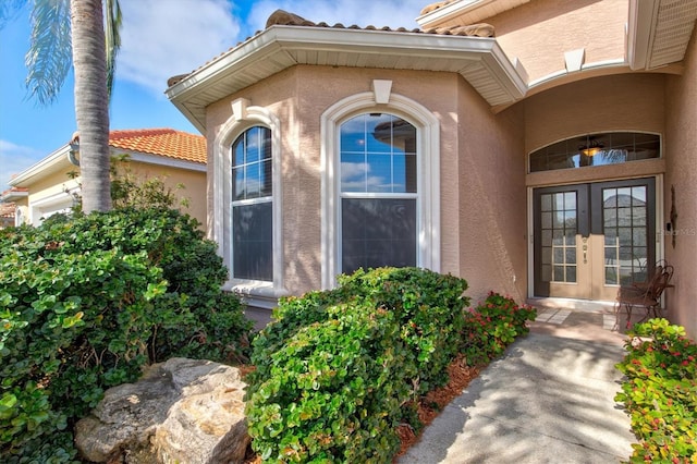 doorway to property featuring french doors