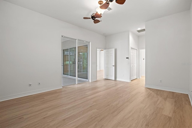 unfurnished room featuring ceiling fan and light hardwood / wood-style floors