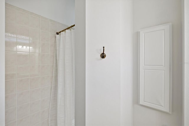 bathroom featuring walk in shower