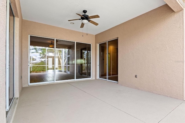 view of patio featuring ceiling fan