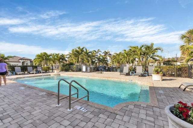 view of pool featuring a patio