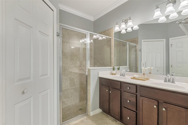 bathroom with vanity, tile patterned floors, an enclosed shower, and ornamental molding