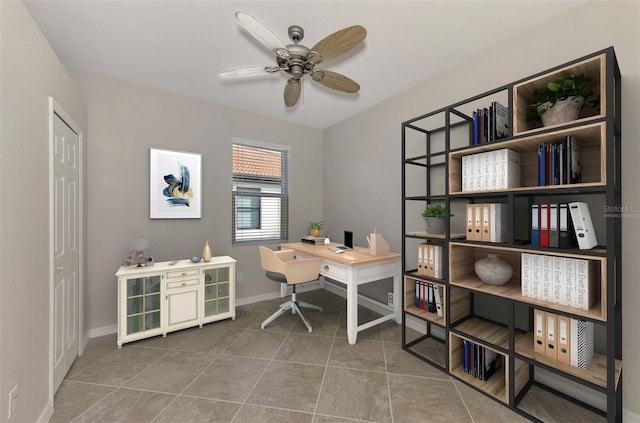 tiled office space with ceiling fan