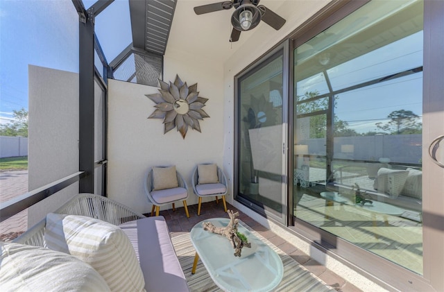 balcony featuring ceiling fan