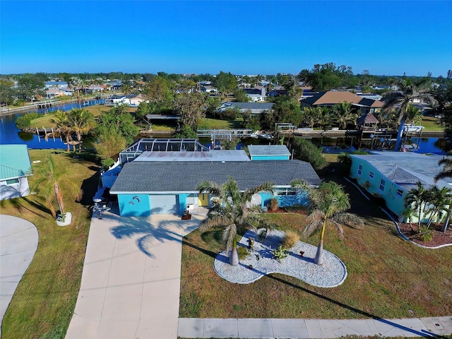 drone / aerial view with a water view