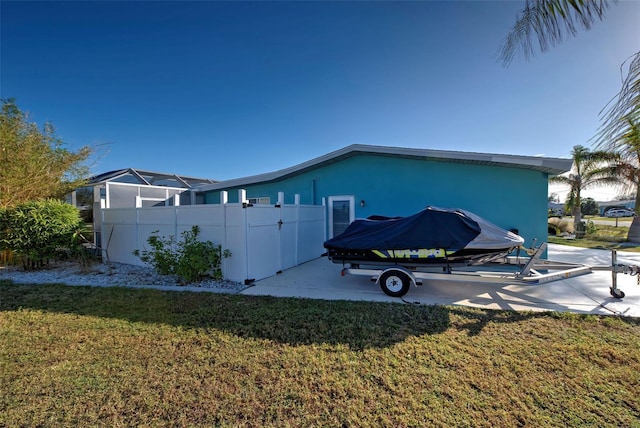 view of home's exterior with a yard