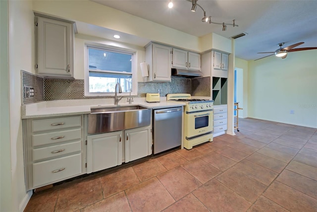 kitchen featuring dishwasher, tasteful backsplash, white range with gas cooktop, and ceiling fan