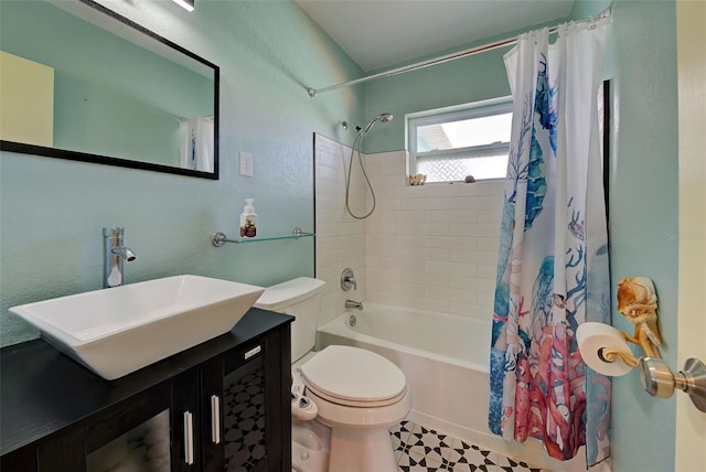 full bathroom with vanity, toilet, and shower / bath combo with shower curtain