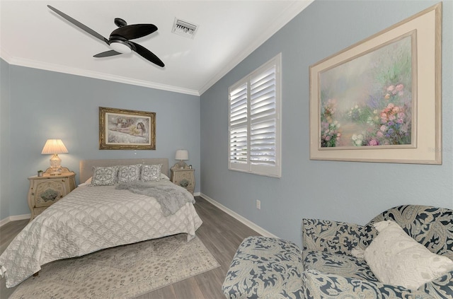 bedroom with ceiling fan, crown molding, and dark hardwood / wood-style floors