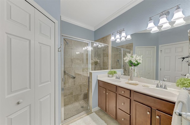 bathroom with vanity, tile patterned floors, ornamental molding, walk in shower, and a notable chandelier