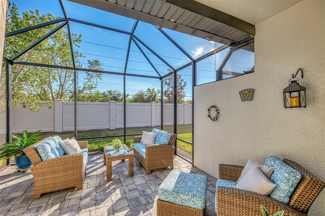 view of patio / terrace featuring a lanai