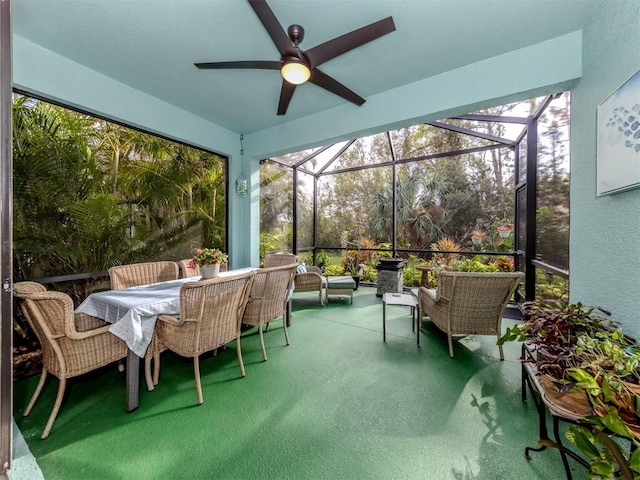 sunroom / solarium with ceiling fan