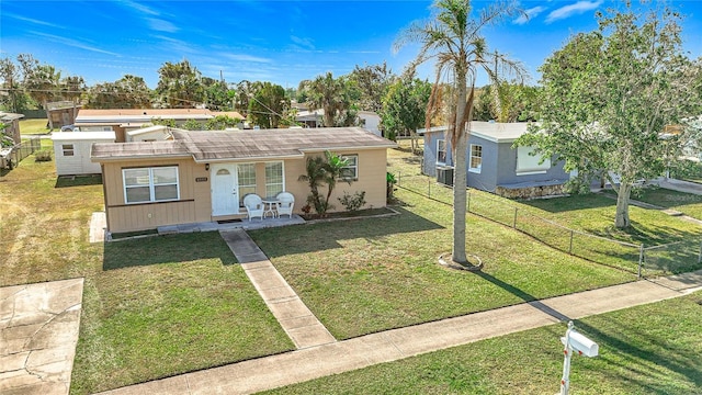 view of front facade with a front yard