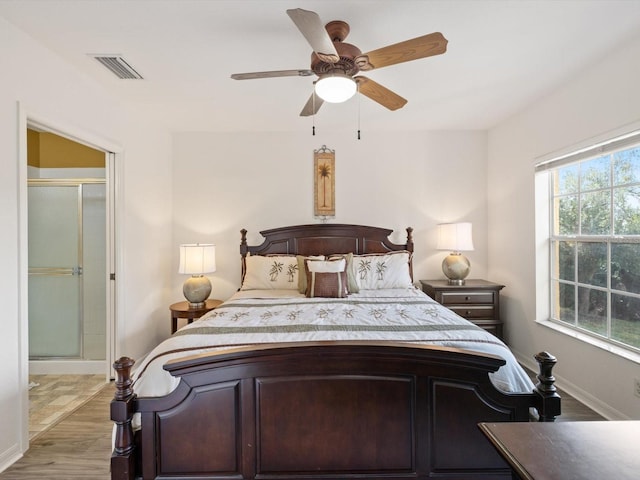 bedroom with ceiling fan and light wood-type flooring