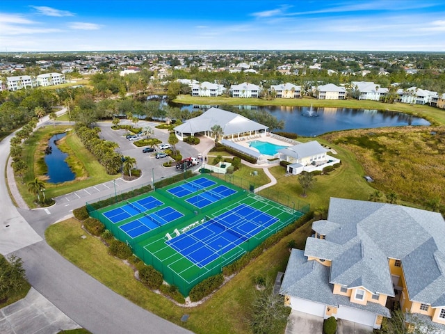 birds eye view of property featuring a water view